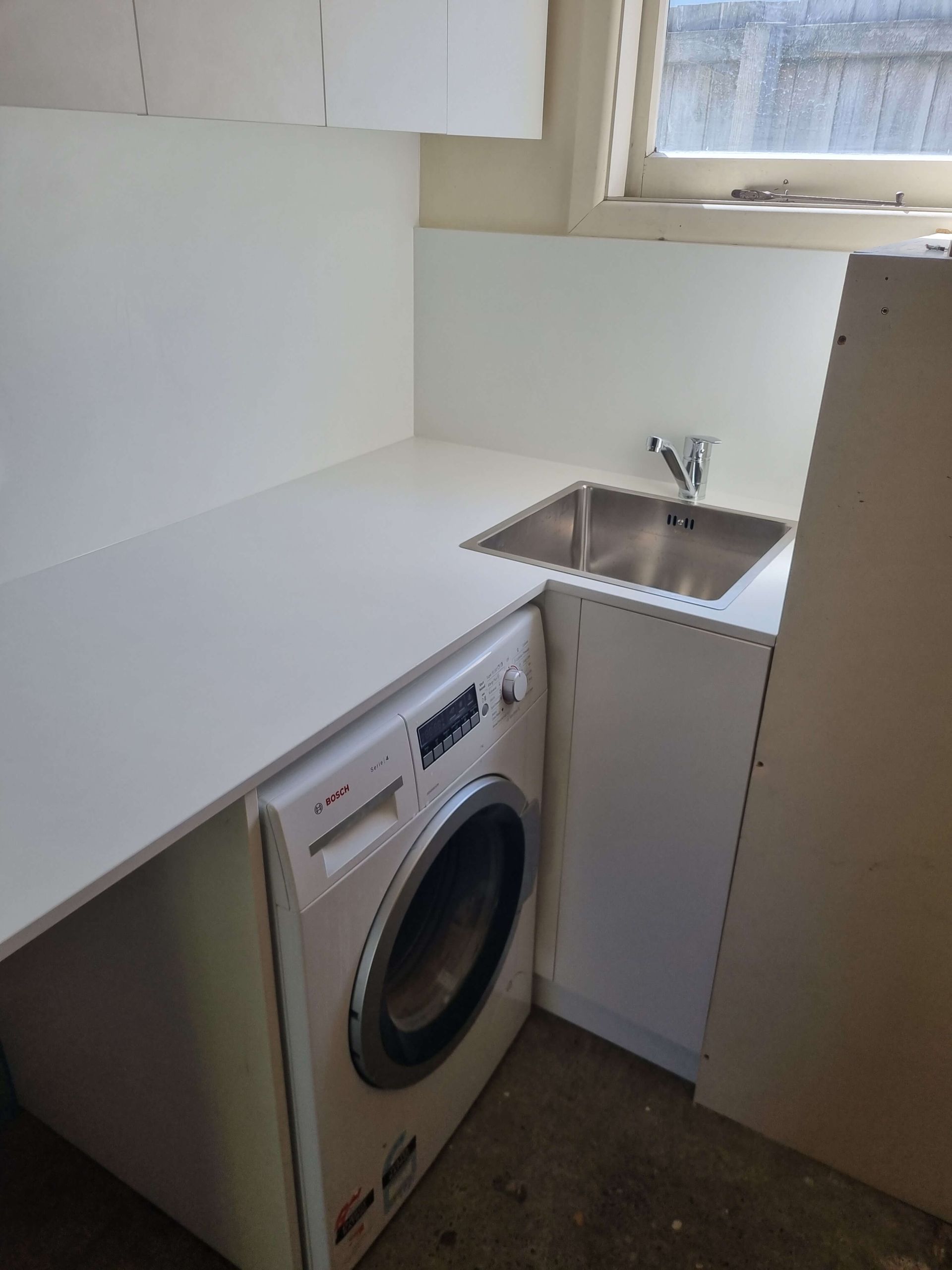 Custom garage laundry renovation by Appleton Builders