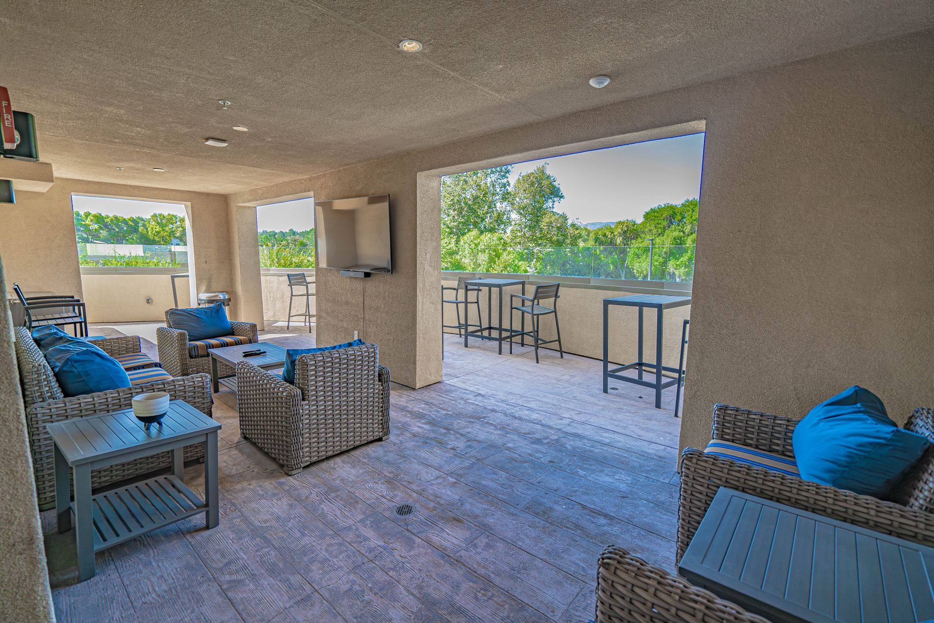 Quill Terrace with BBQ’s and view of Valencia Country Club