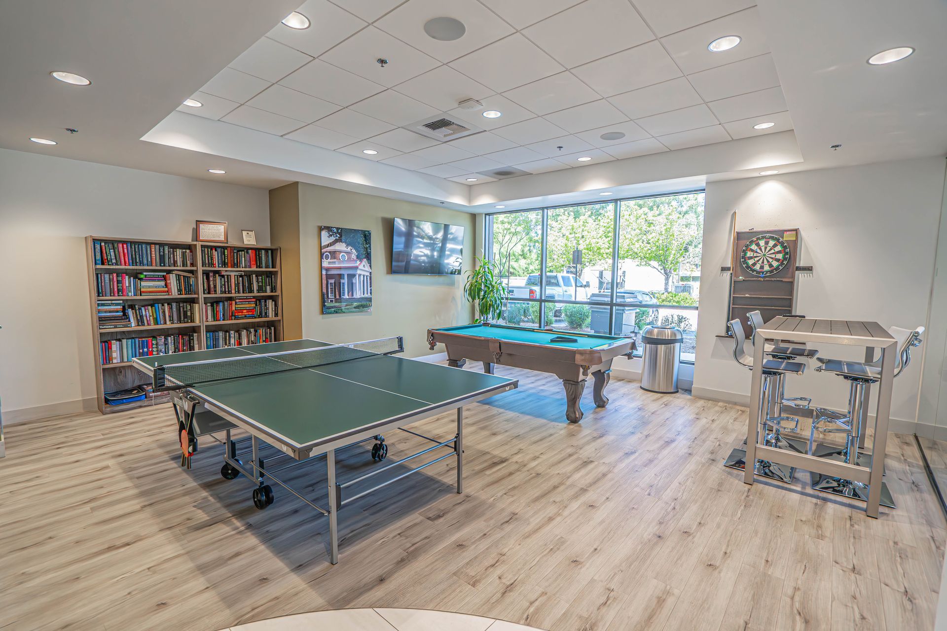photo of the monticello apartements game room and tables on the first level
