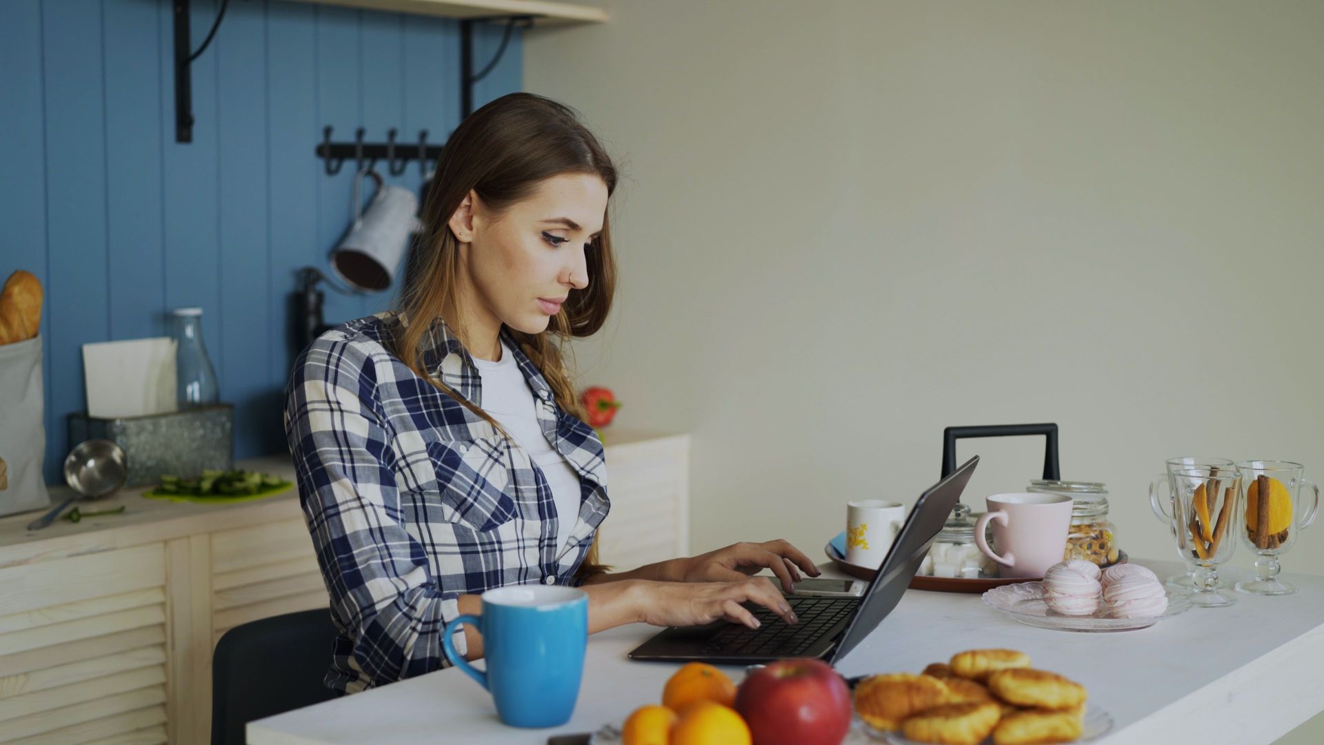 woman working from home on her laptop