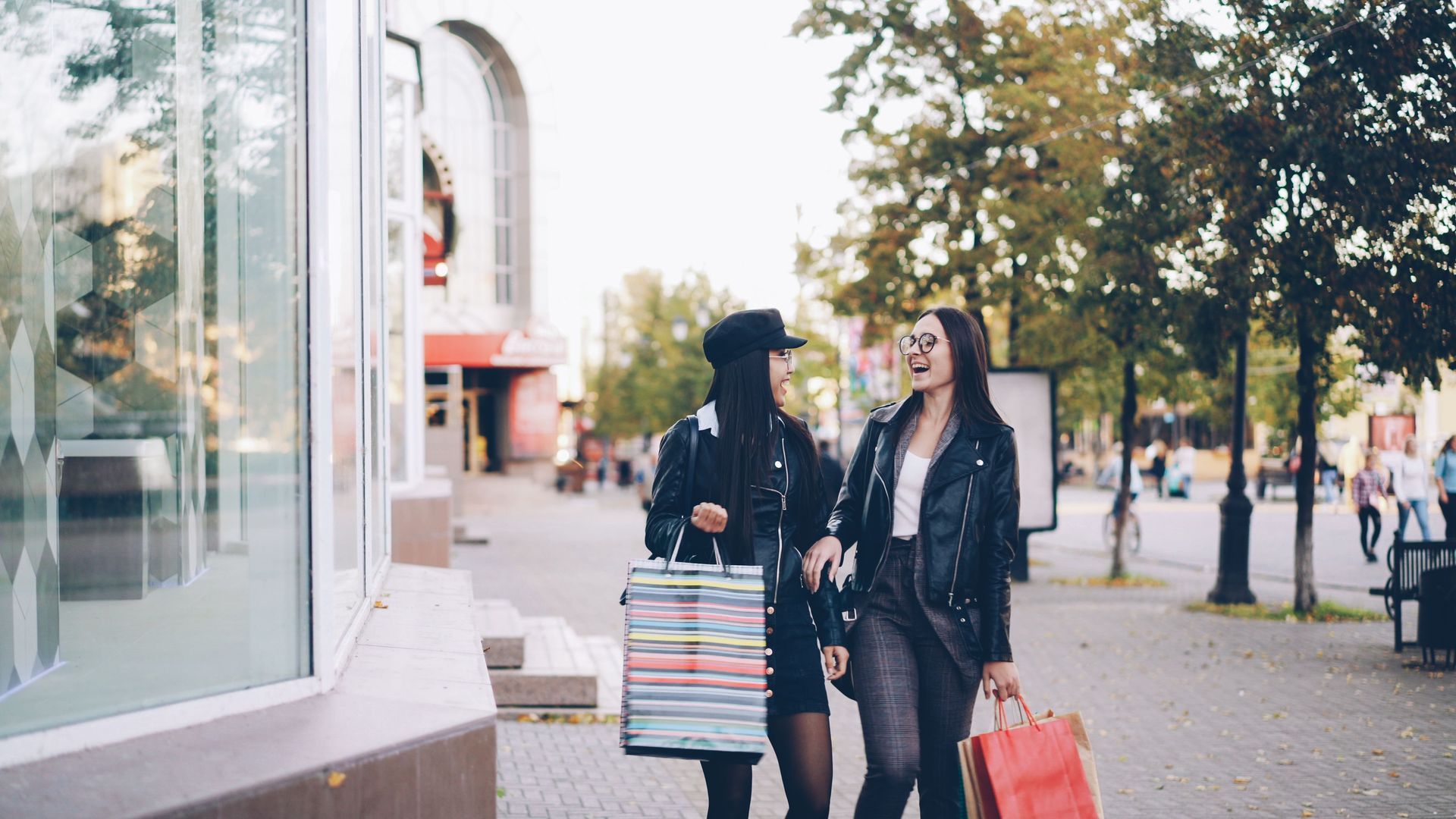 women shopping and carrying bags 