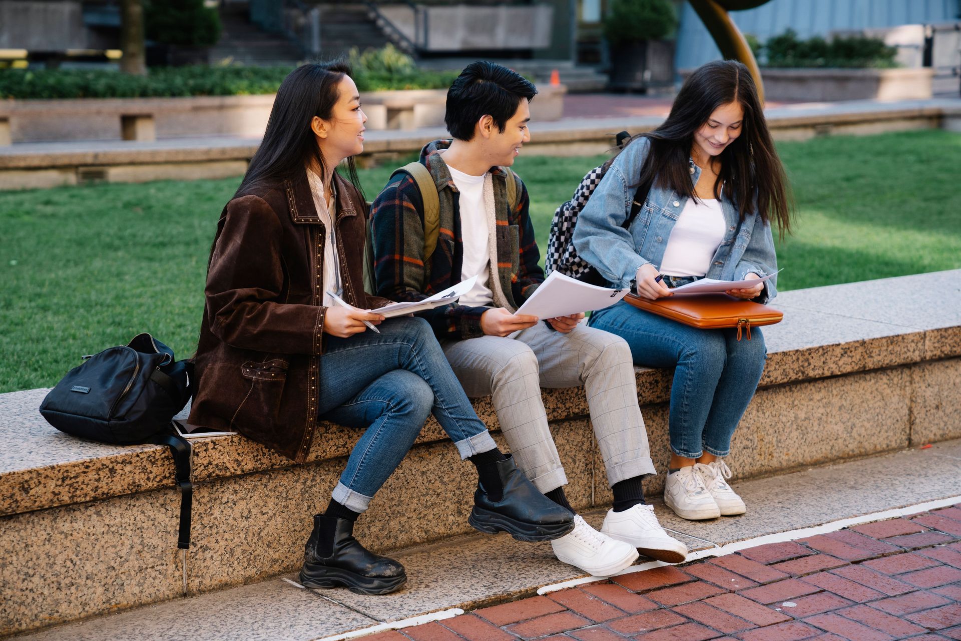 college students sitting outside near a college campus in Santa clarita