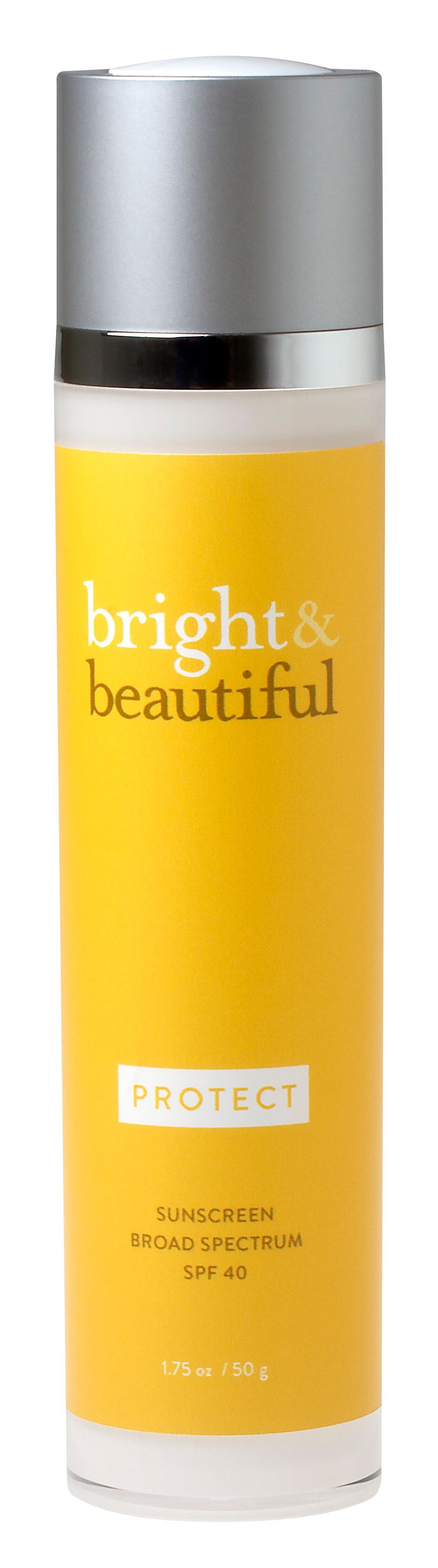 A bottle of bright & beautiful lotion on a white background.
