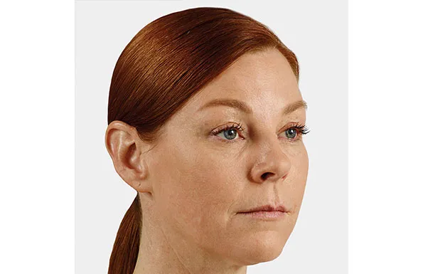 a close up of a woman 's face on a white background