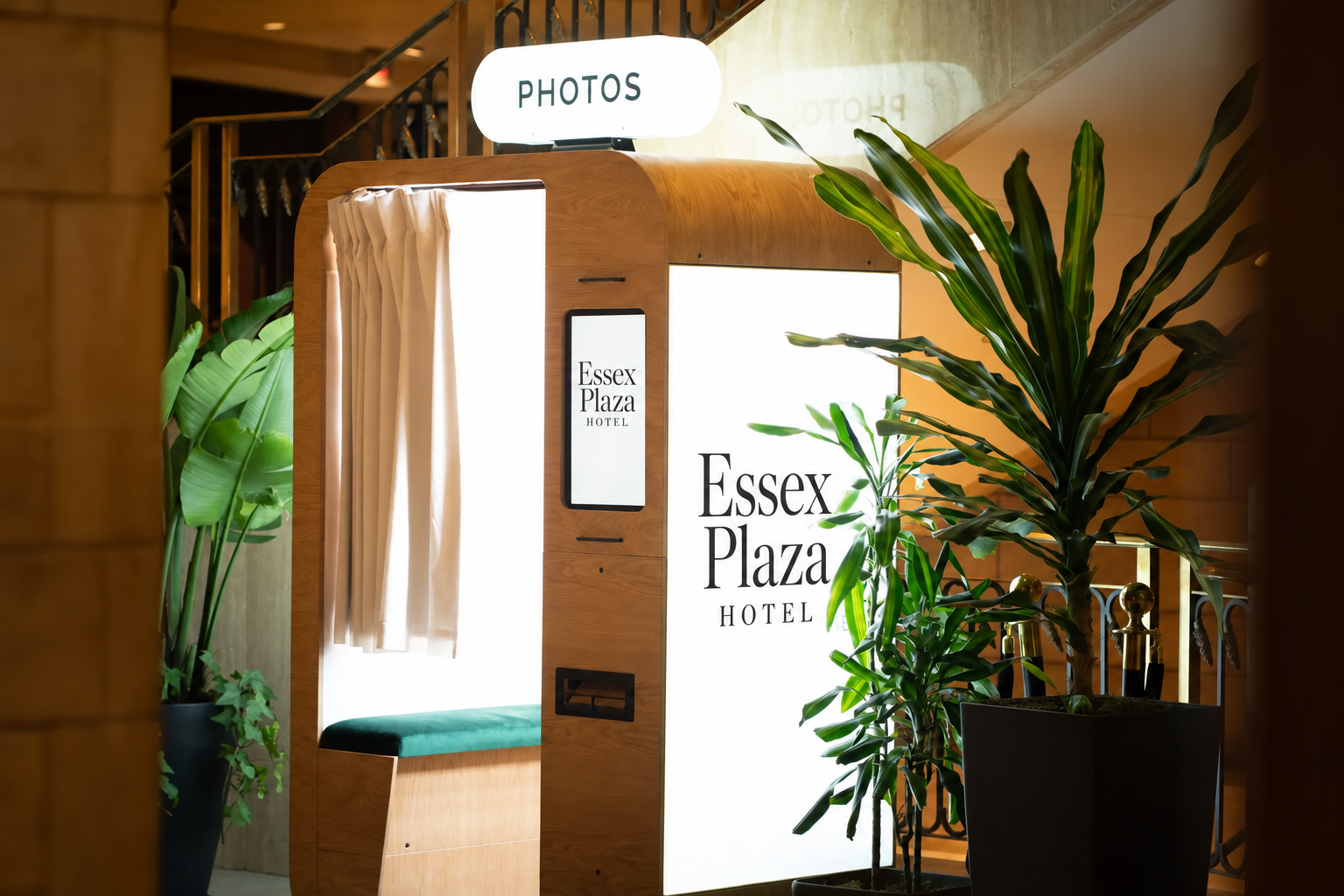 Branded photo booth and signage installed at a hotel venue