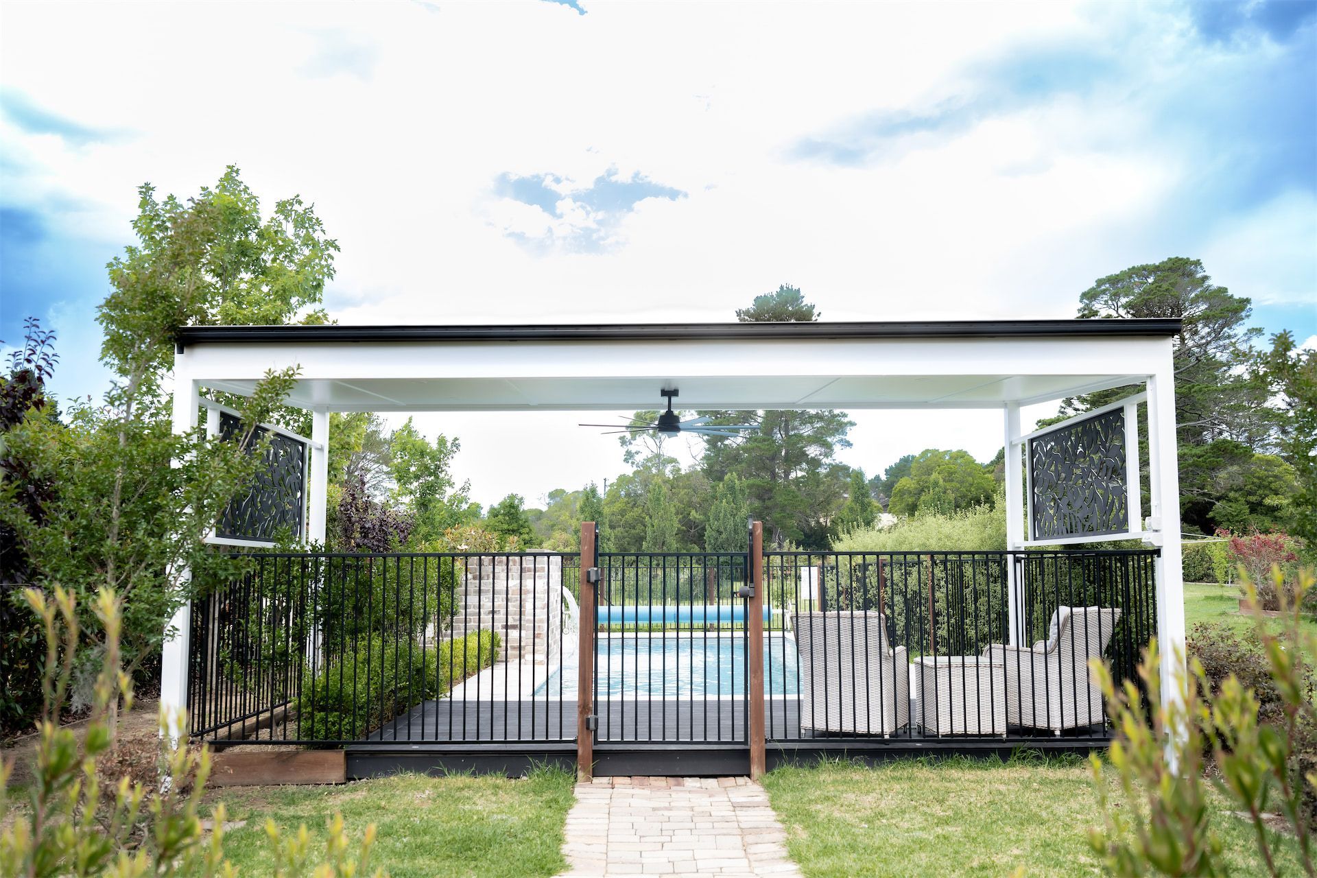 Backyard Swimming Pool With a White Pergola — Prime Built in Bowral, NSW