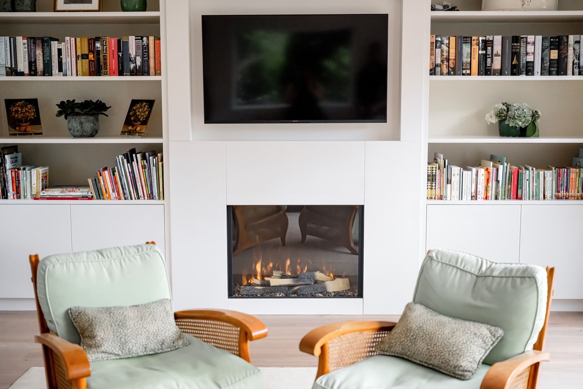 Cozy Living Room With Fireplace, Wall-mounted TV, Bookshelves — Prime Built in Bowral, NSW