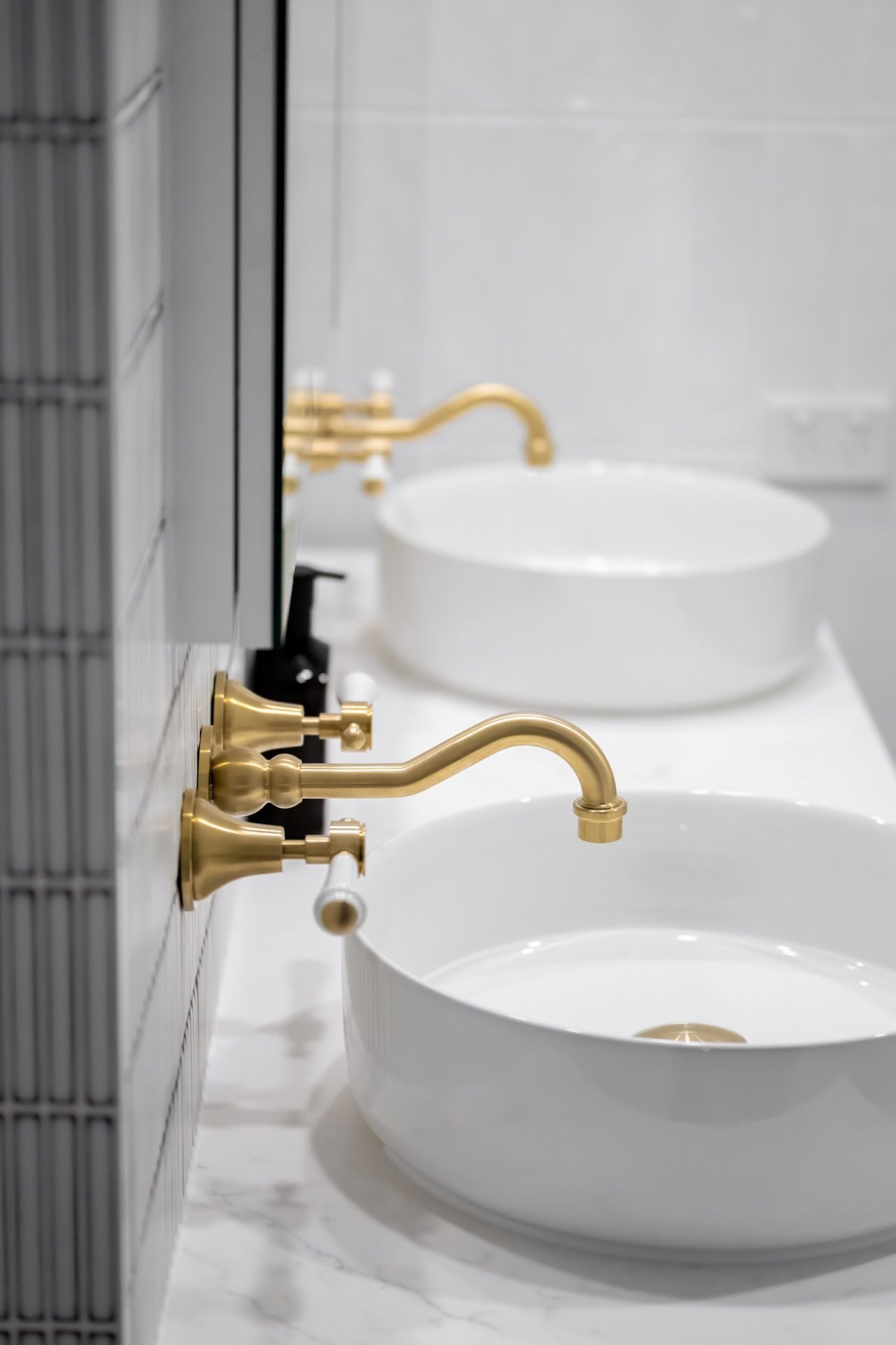 White Vessel Sinks With Gold Faucets in a Modern Bathroom — Prime Built in Bowral, NSW