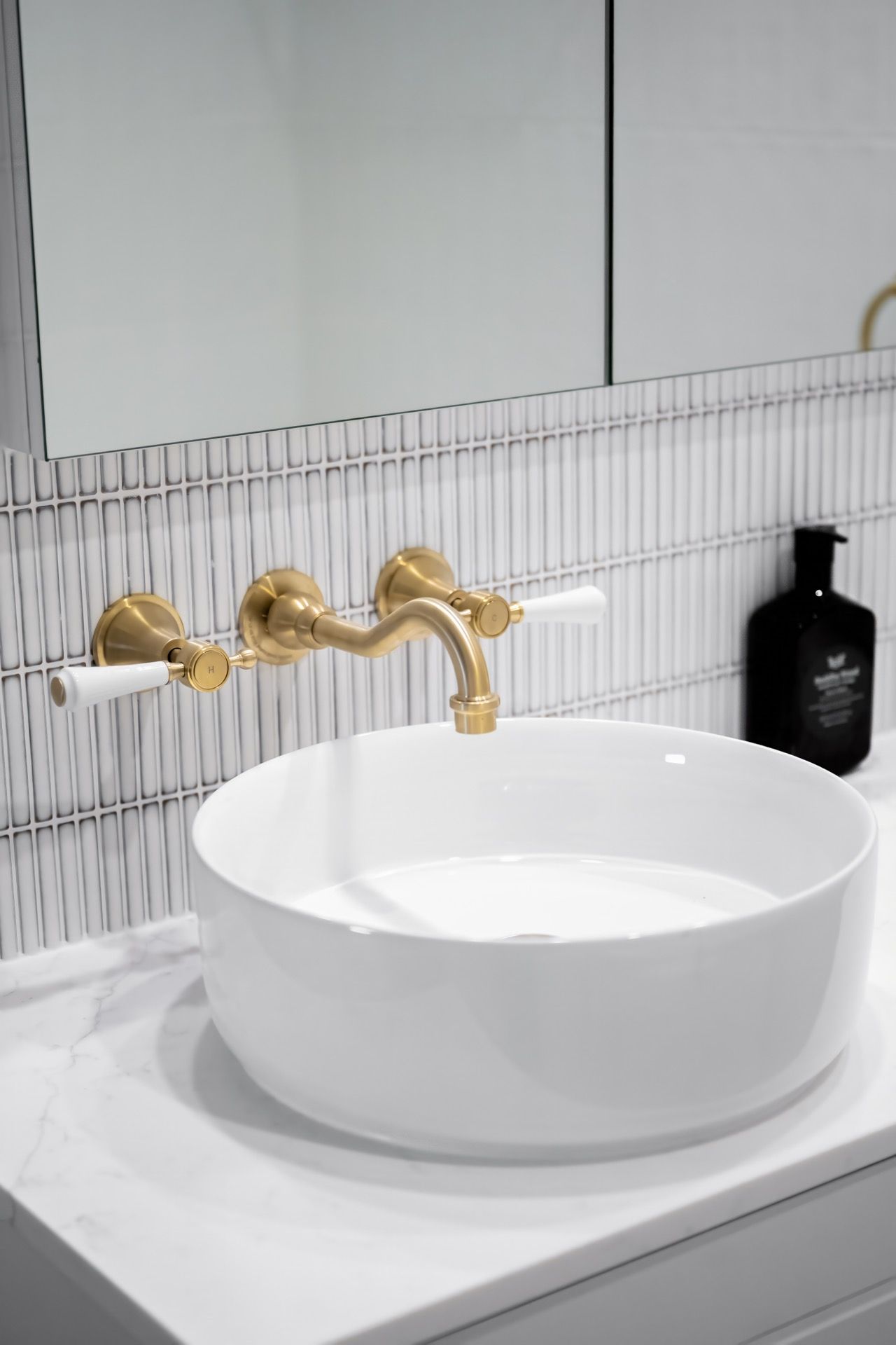 White Round Vessel Sink With Gold Faucet on a Marble Bathroom Vanity — Prime Built in Bowral, NSW