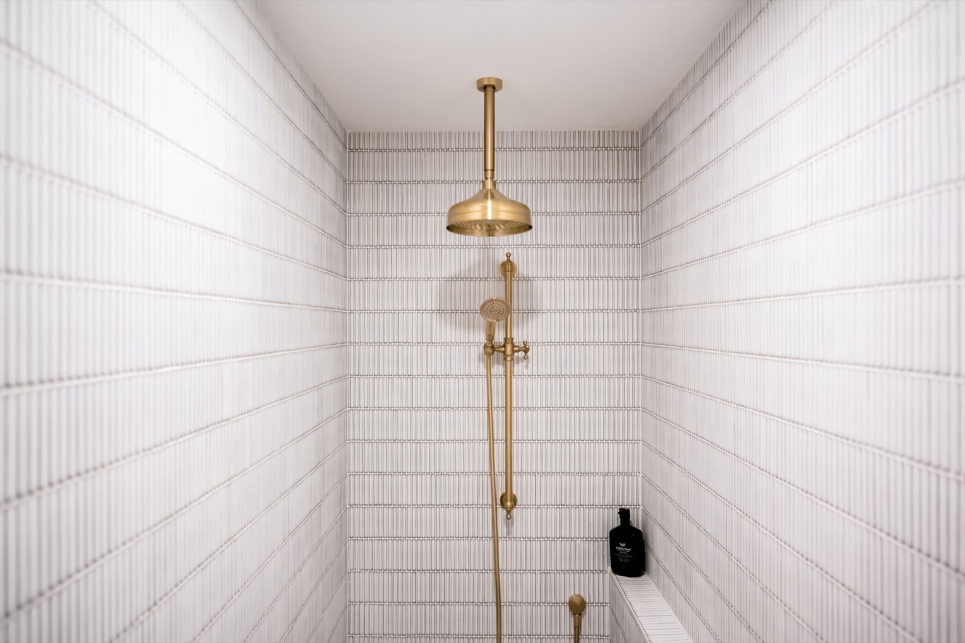White Tiled Shower With Gold Rain Showerhead and Fixtures — Prime Built in Bowral, NSW