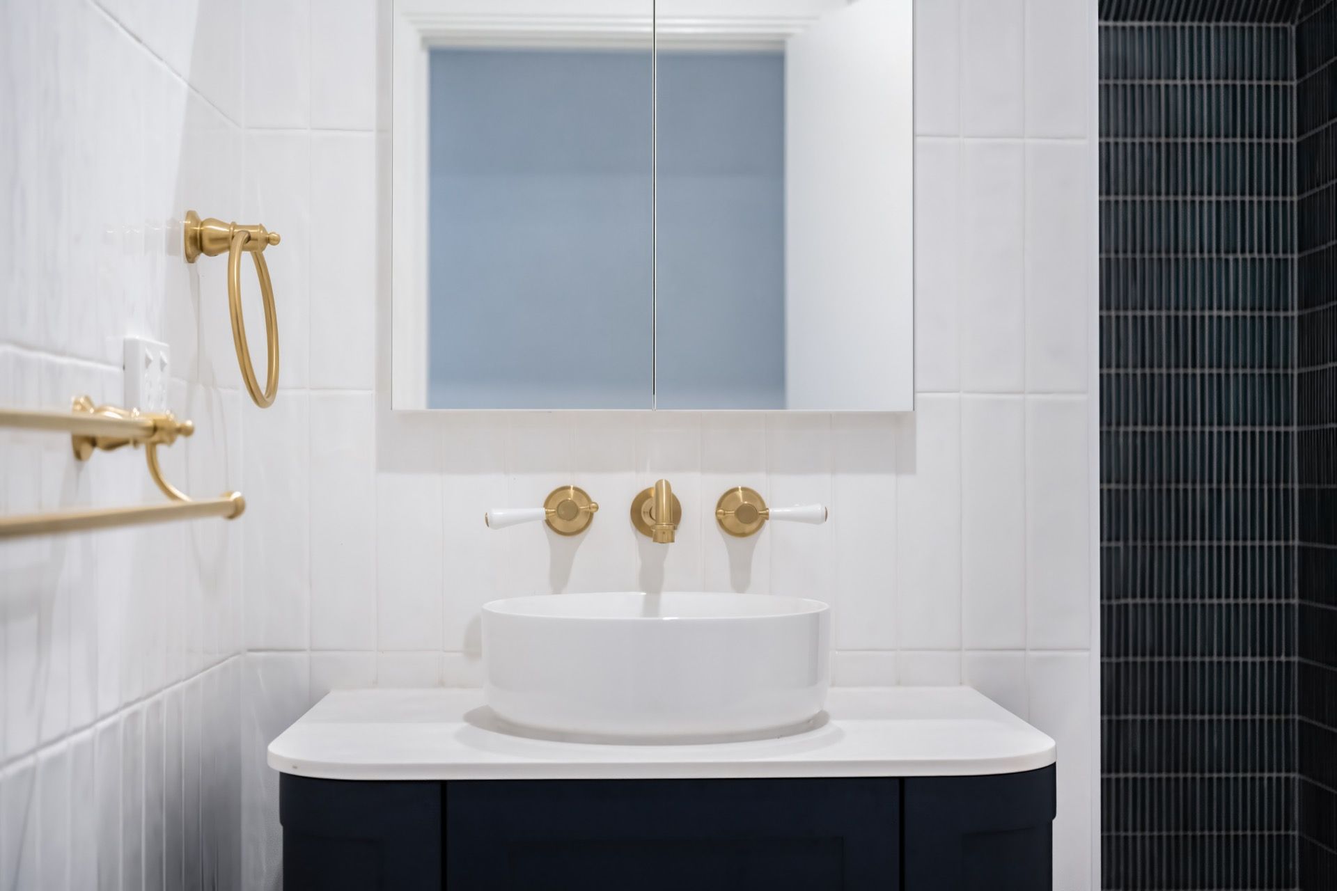 Modern Bathroom Vanity With Round Sink, Gold Fixtures — Prime Built Group in Bowral, NSW