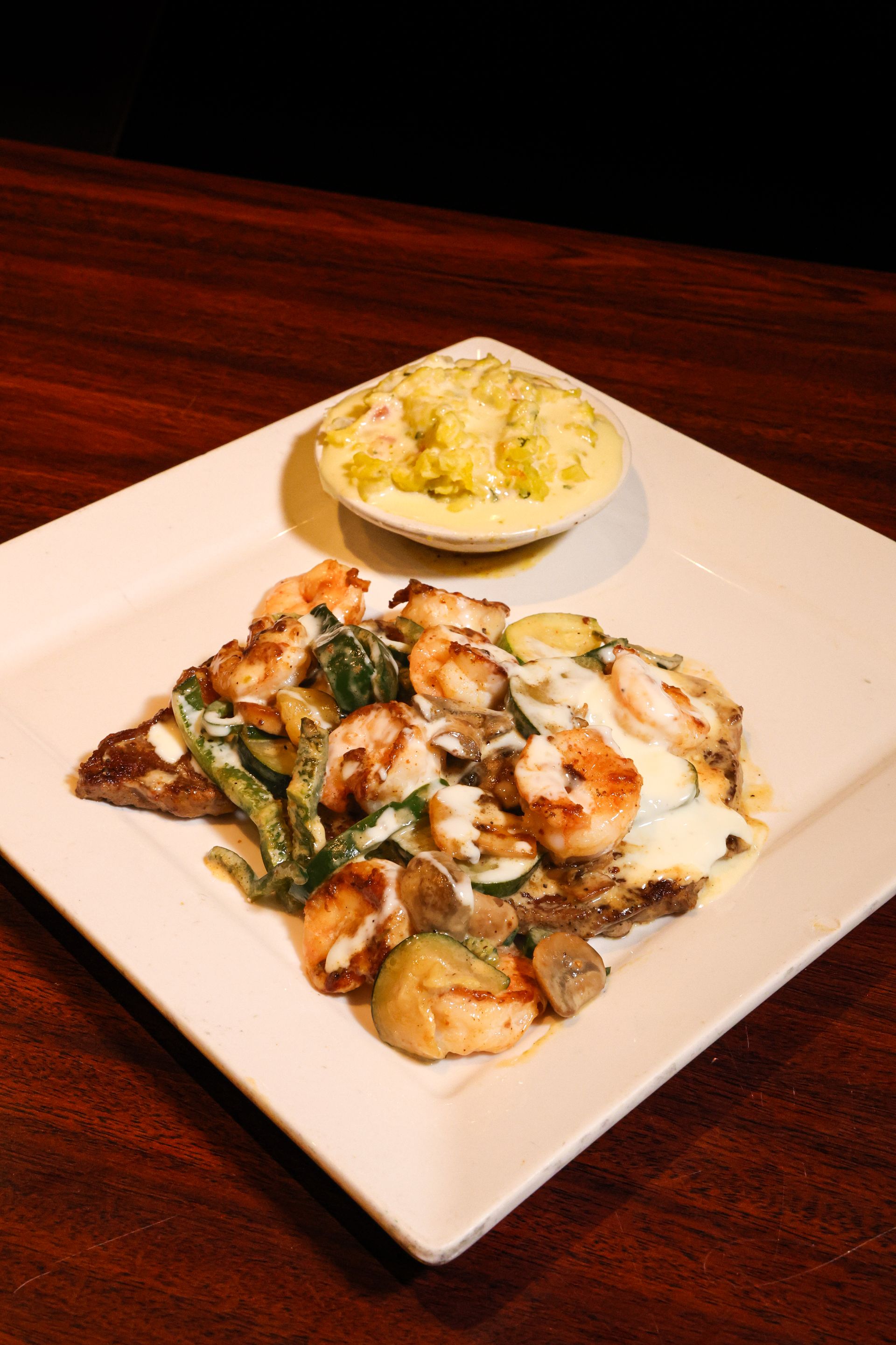 Enchiladas smothered in sauce and cheese with rice, served at Don Ramon Mexican Grill & Cantina.