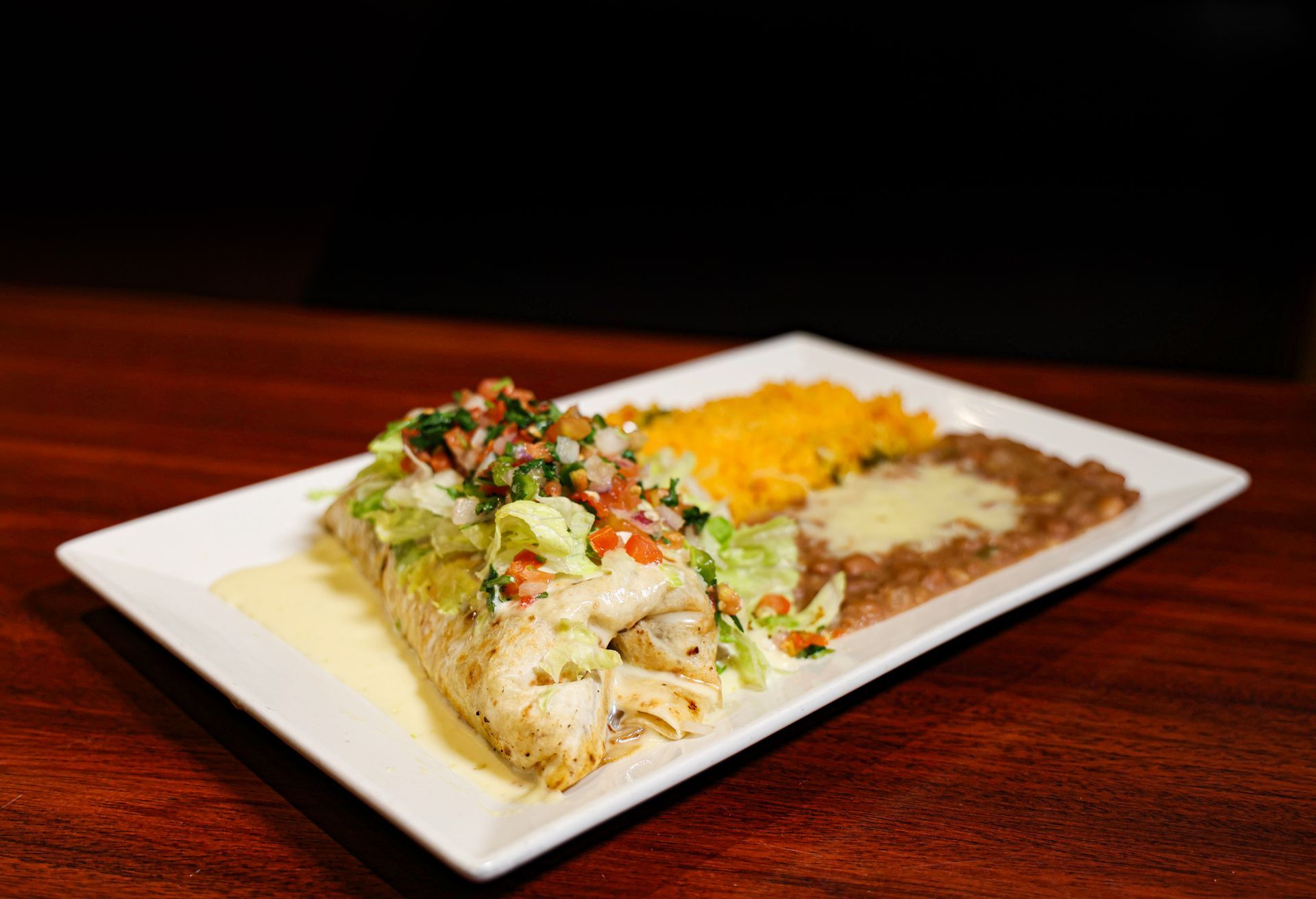 Grilled chicken fajitas with bell peppers and onions, in foil.