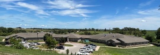 Housing With Parked Cars Outside — Ames, IA — Howell Investment Finance