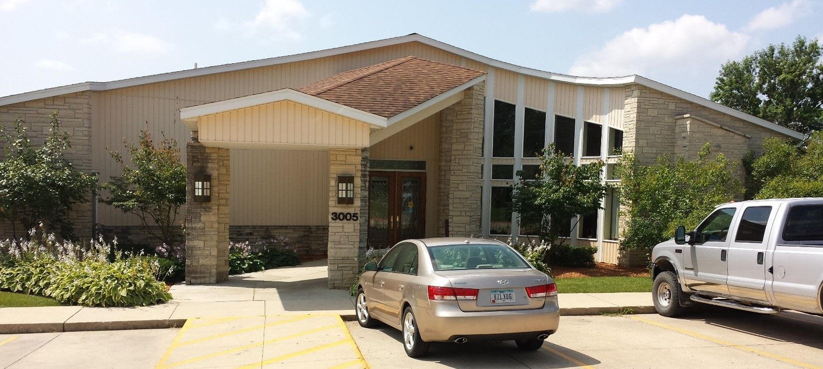 Car Parked Outside The House — Ames, IA — Howell Investment Finance