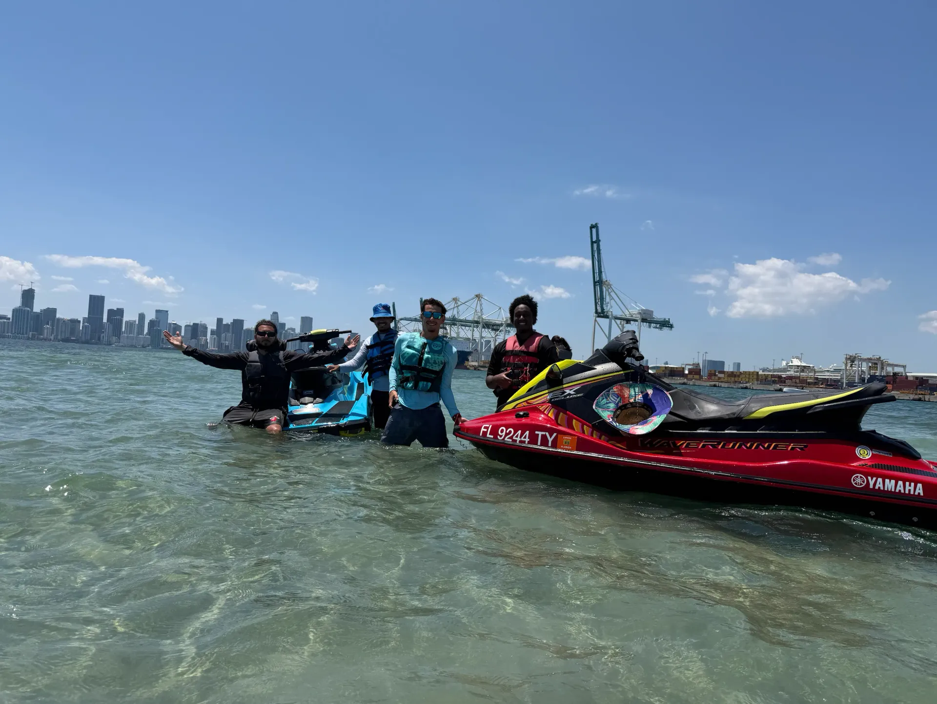 Guests enjoying a guided Miami jet ski tour group experience near the Downtown Miami skyline