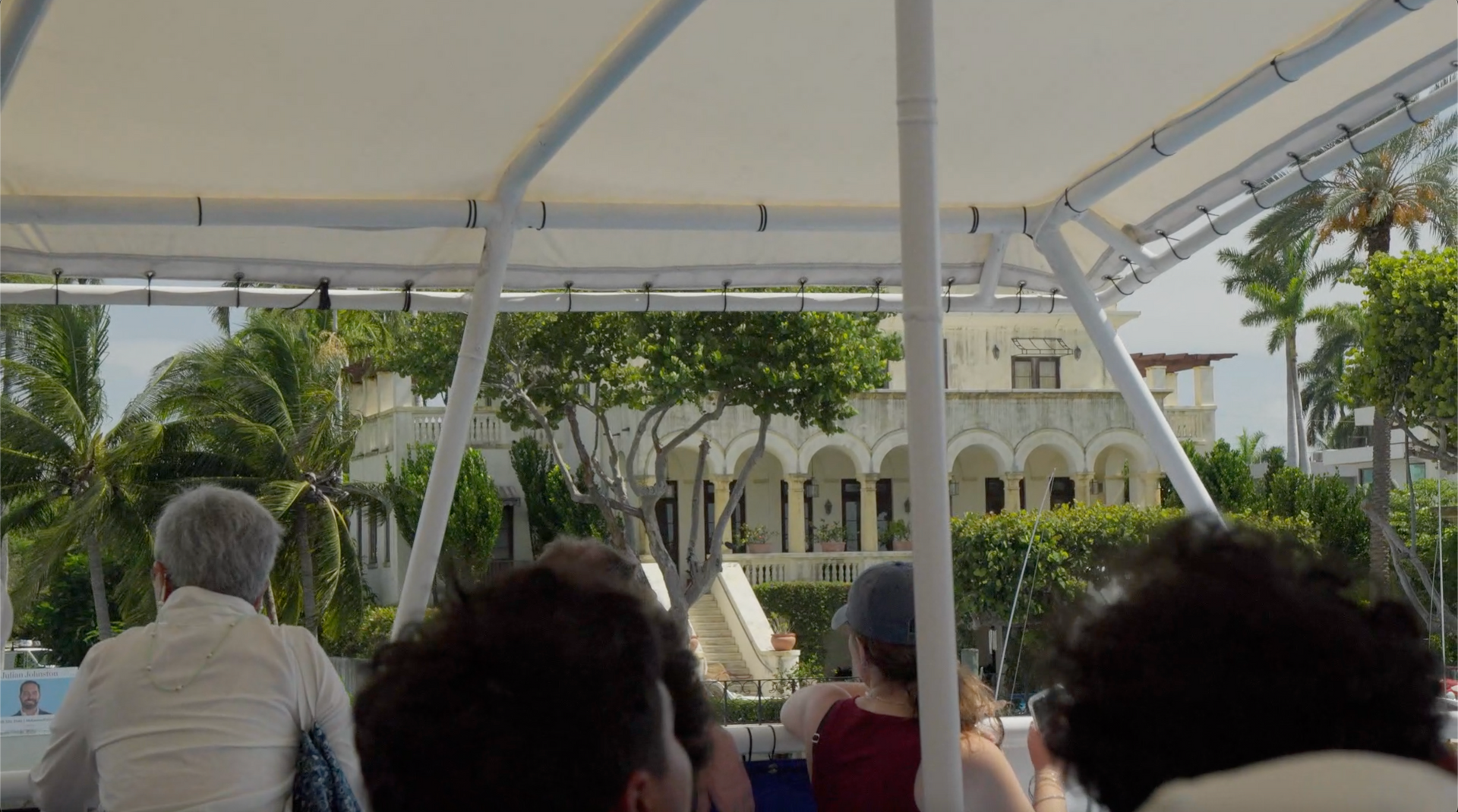 Luxury waterfront mansion seen from a sightseeing cruise in Miami