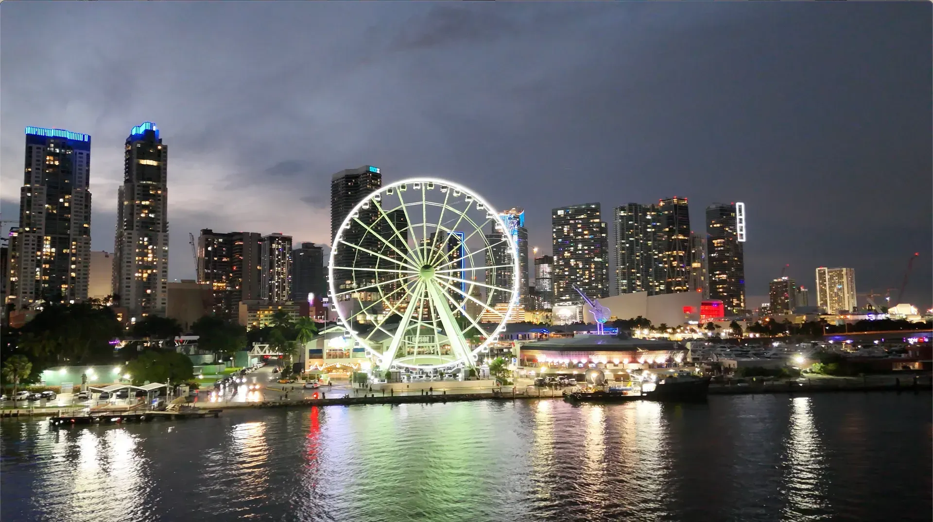Waterfront attractions and evening city views during a Miami Evening Cruise