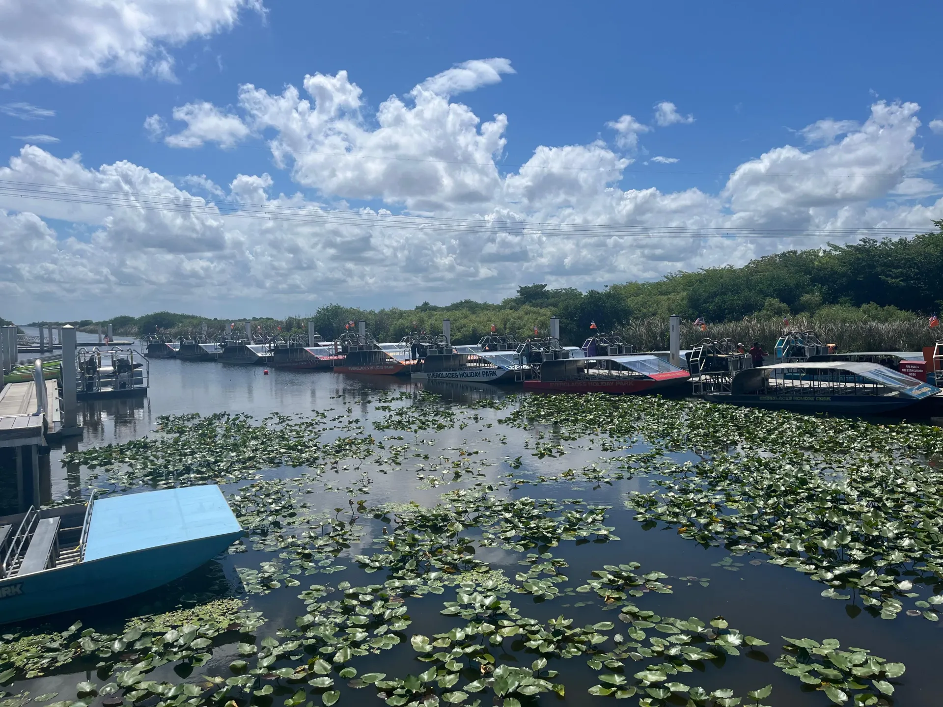 Miami Everglades airboat departure area with multiple airboats ready for guests before their Everglades adventure.