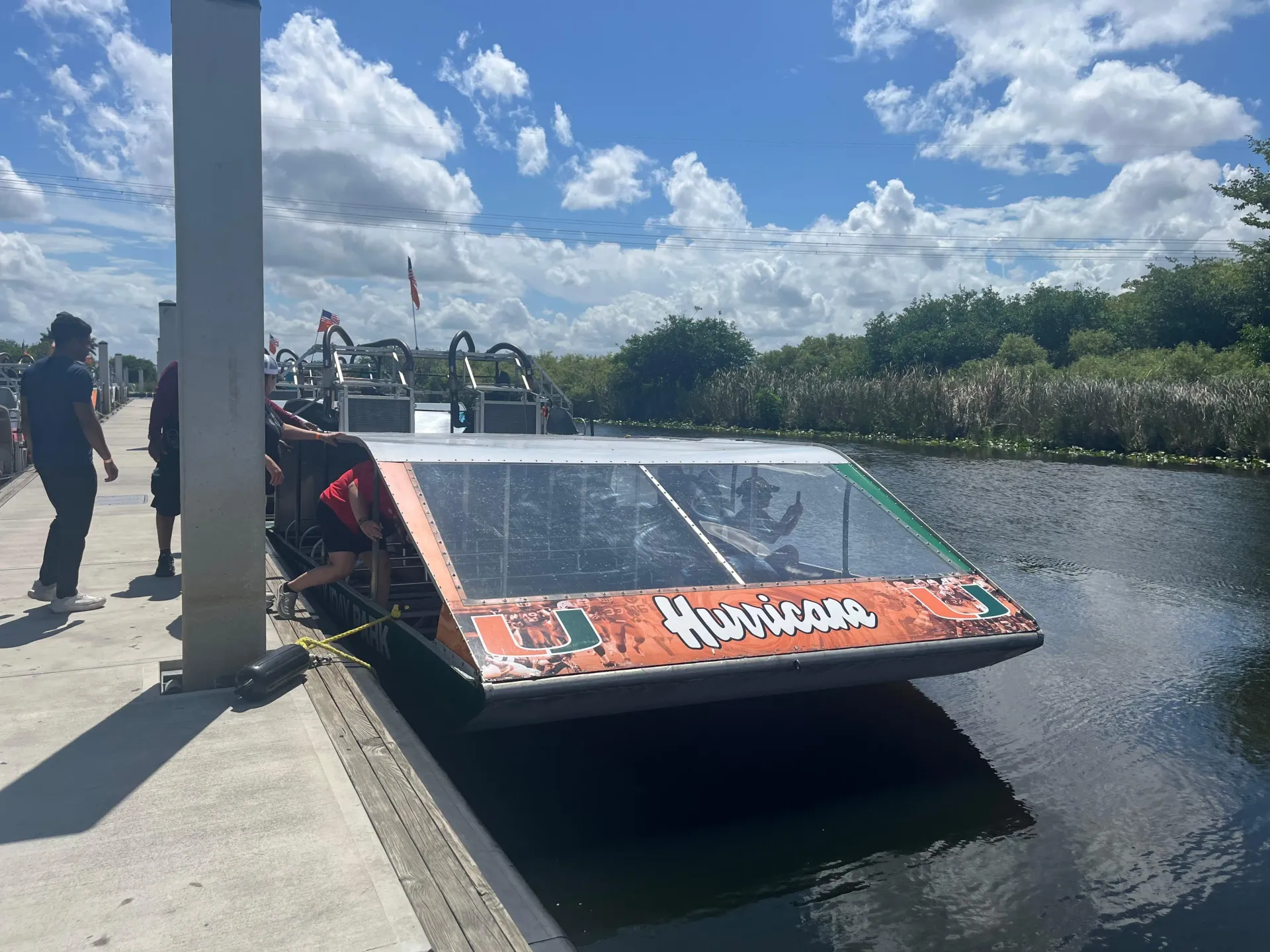 Guests preparing to board a Miami Everglades airboat before exploring the Florida Everglades.