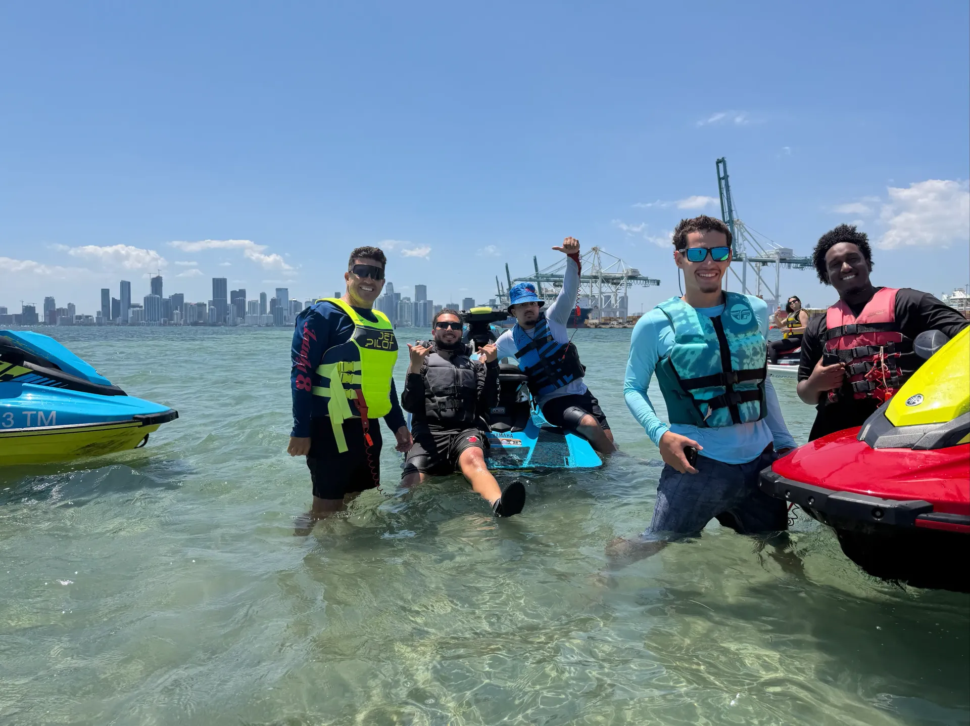 Tour guide and guests enjoying a guided Miami jet ski experience near the Downtown Miami waterfront
