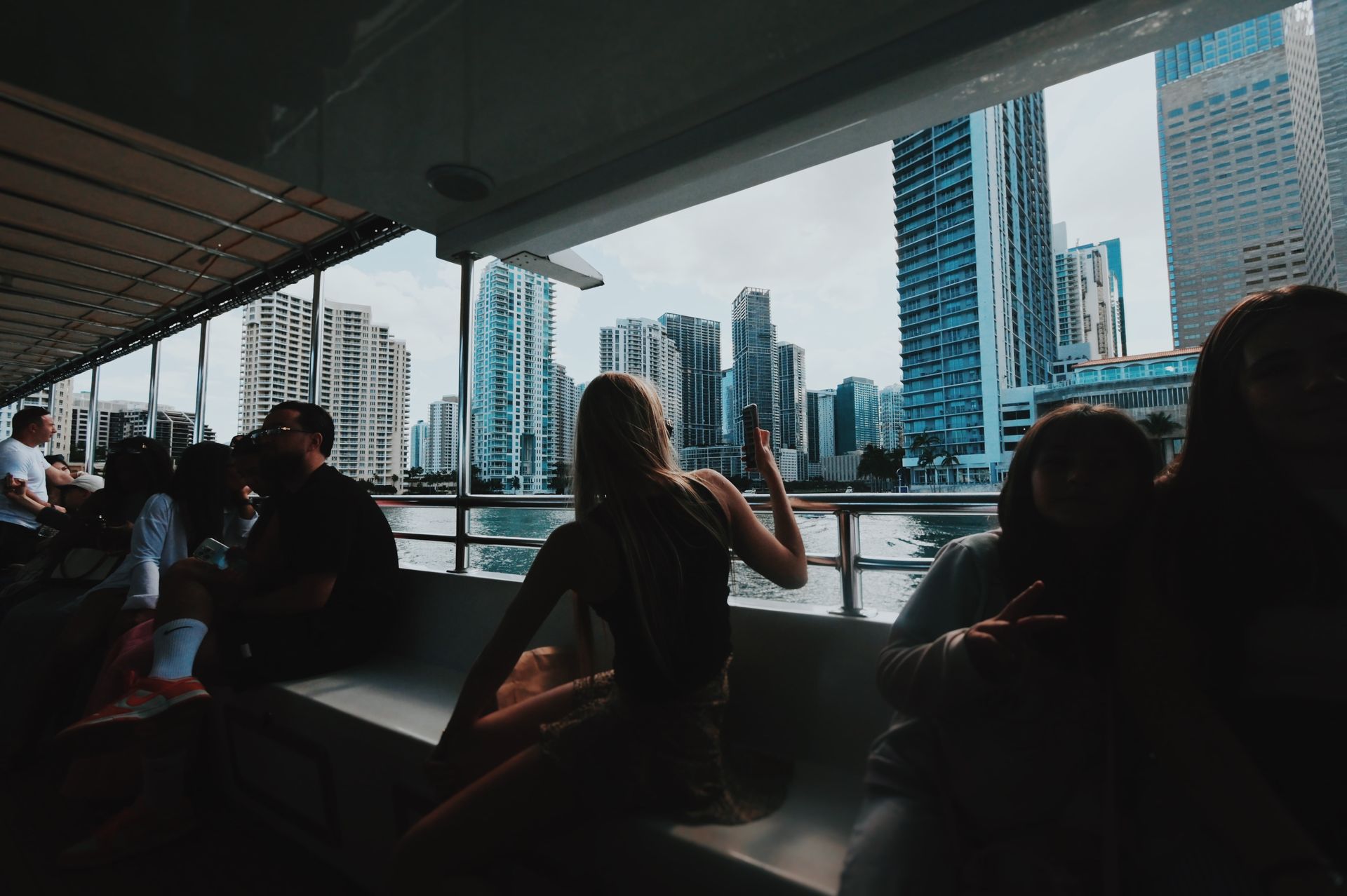 Guest enjoying the Miami Skyline Views if Celebrity Mansions sightseeing Boat tour