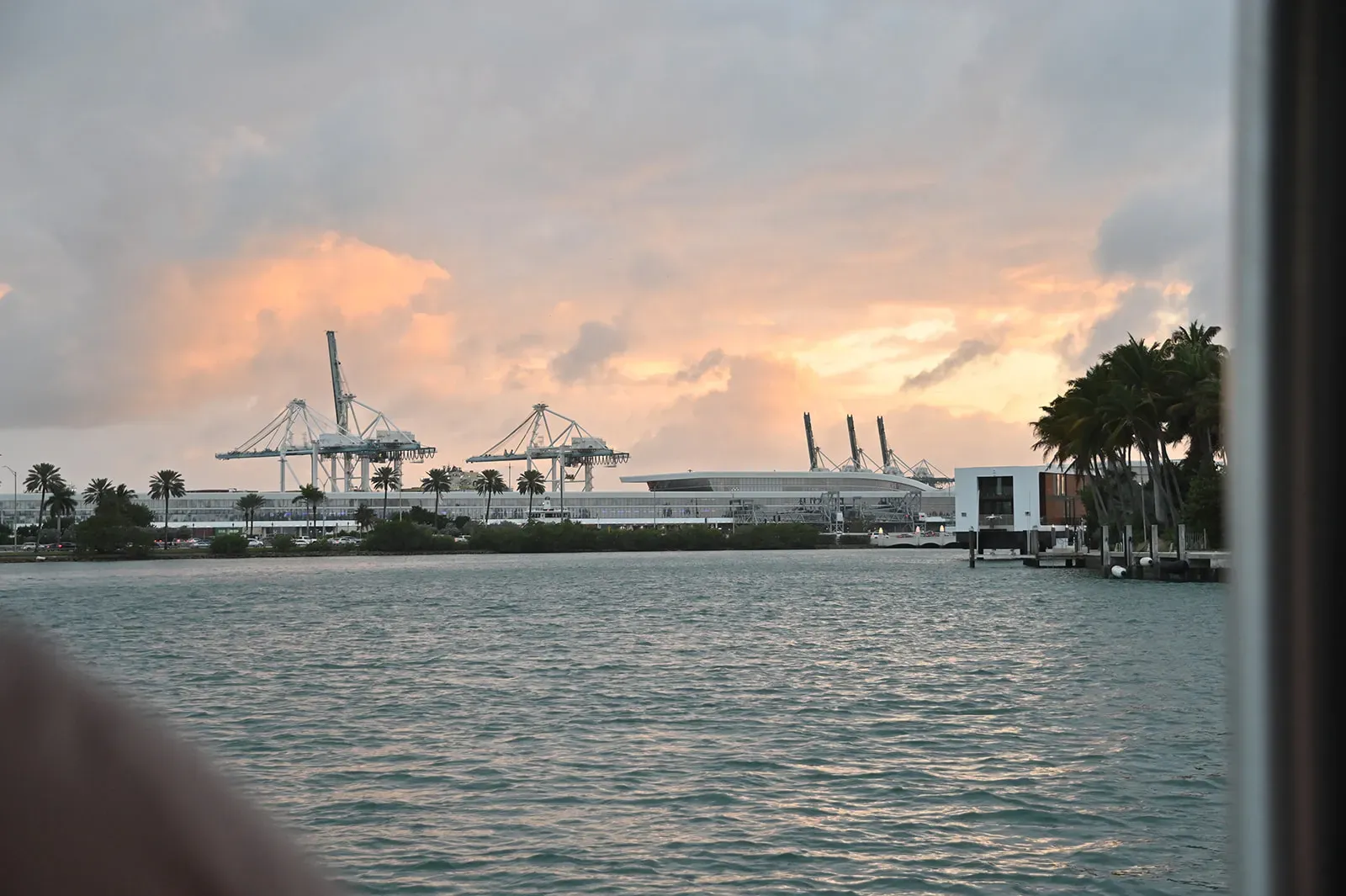 Port of Miami views during a sunset sightseeing cruise with glowing evening skies in Downtown Miami