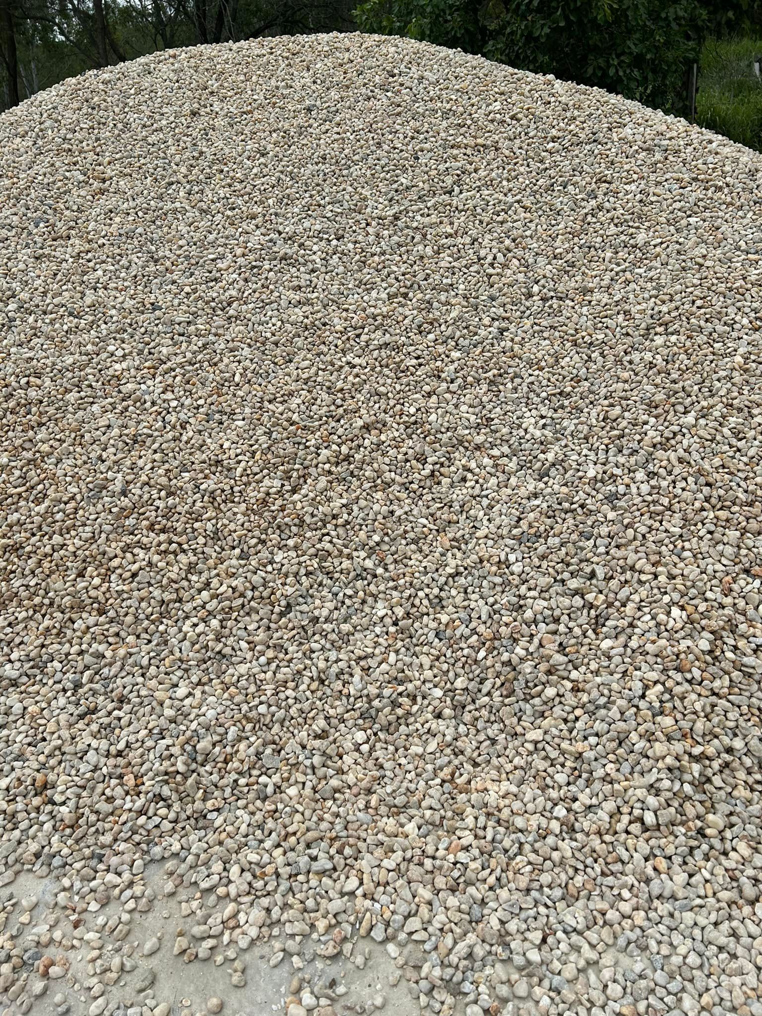 Pile of Beige Gravel, Viewed from Above, Outdoors — Gladstone Garden & Landscaping Supplies In Burua, QLD