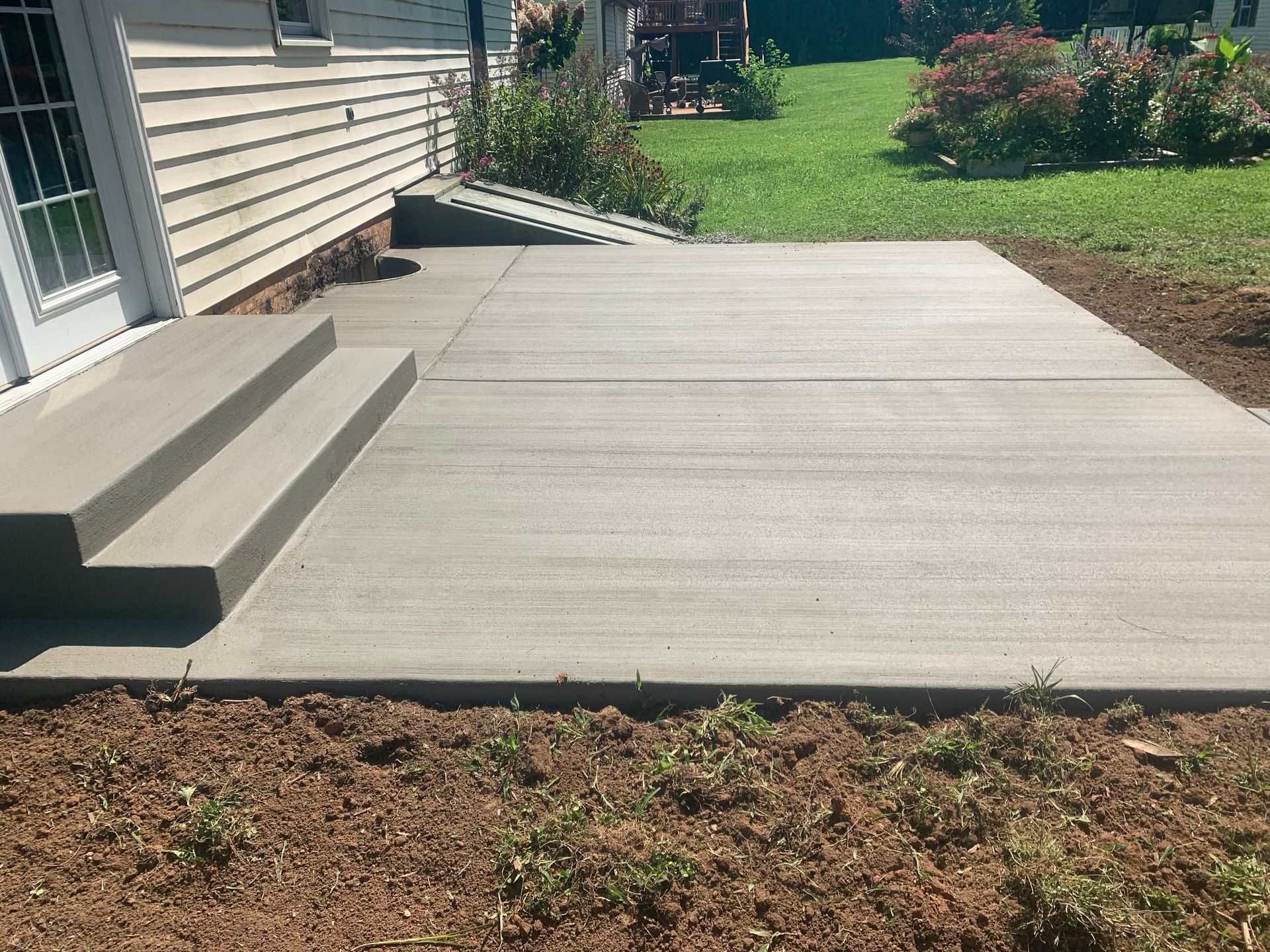 Concrete Patio Installed by Crockett & Sons Concrete on Sunrise Circle in Rising Sun, Md