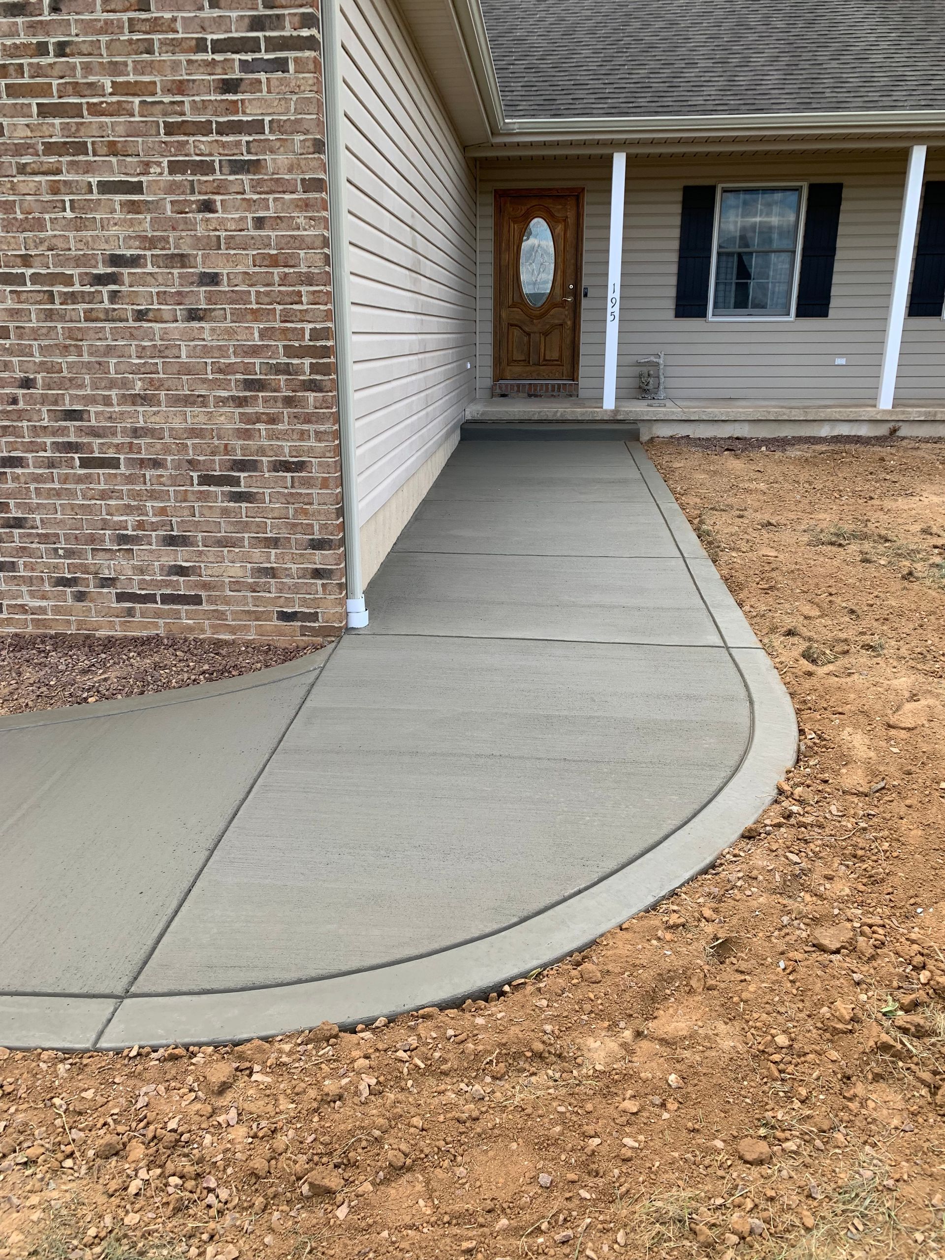 Concrete Sidewalk Installed by Crockett & Sons Concrete on Petty John Rd in Rising Sun, Md
