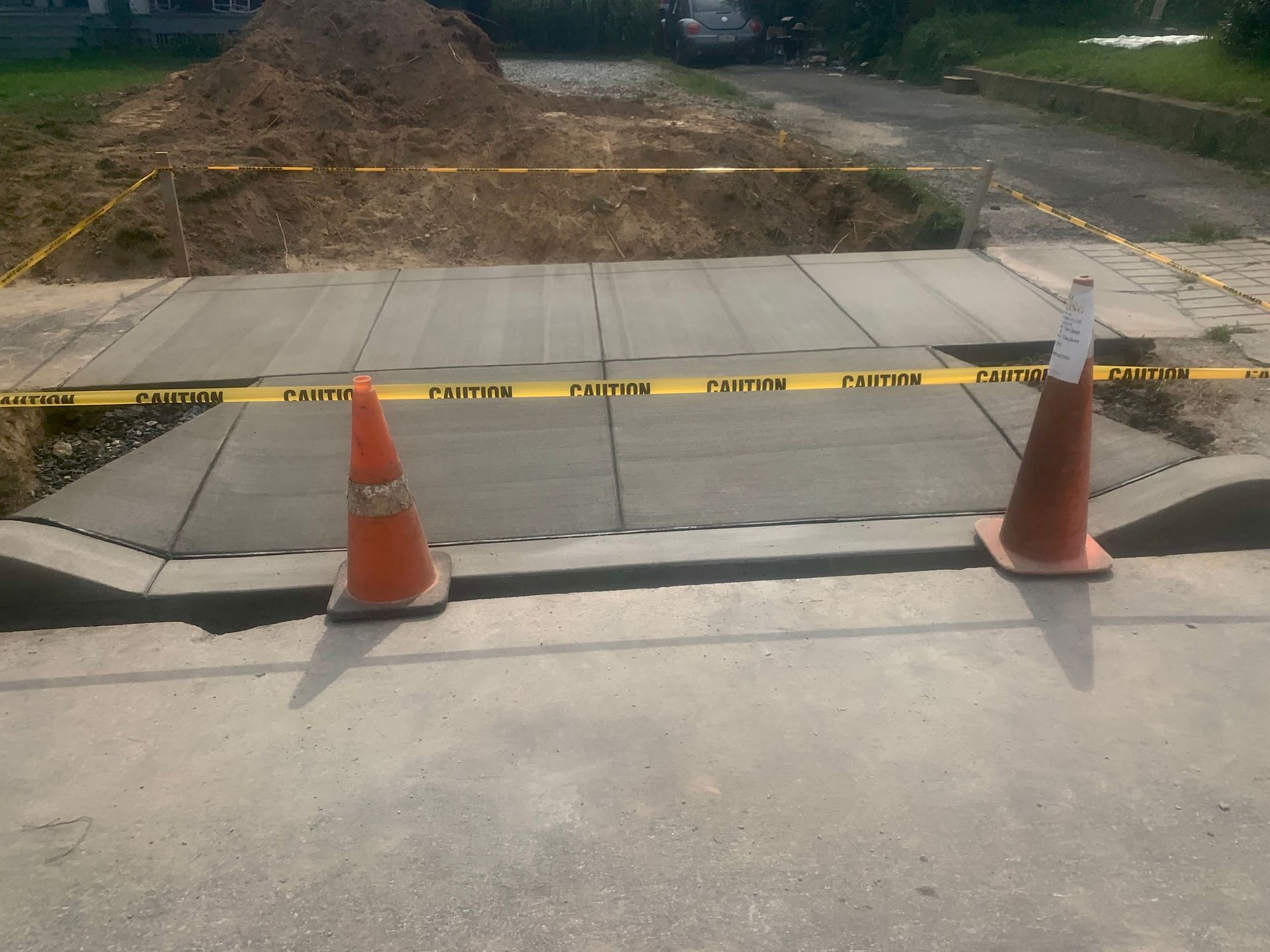 Concrete Sidewalks and Apron Installed by Crockett & Sons Concrete for the Town of Oxford