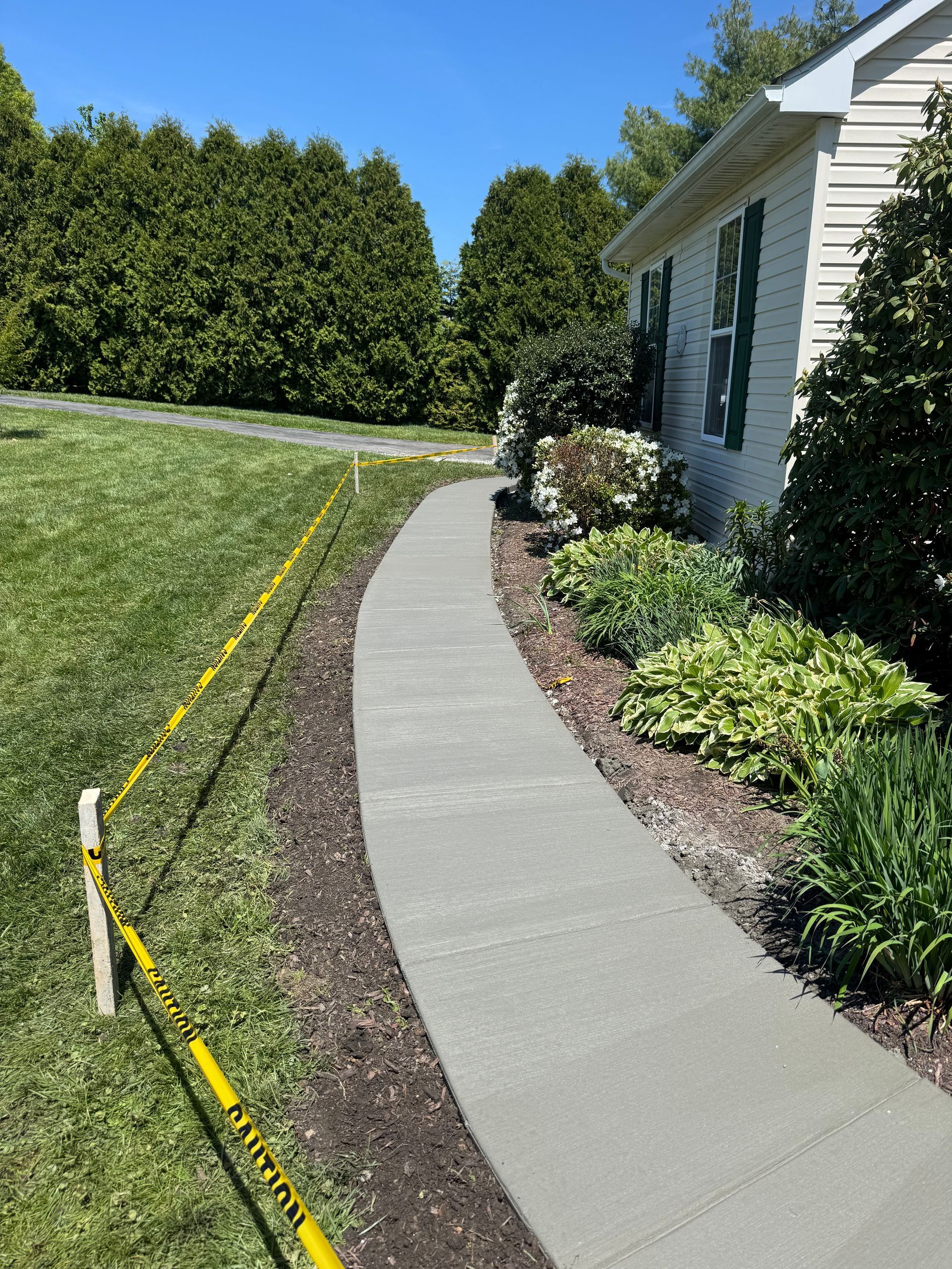 Concrete Sidewalk Installed by Crockett & Sons Concrete on Roylene Drive in Oxford, Pa