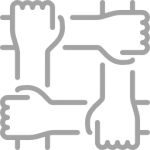 A group of hands holding each other in a circle.