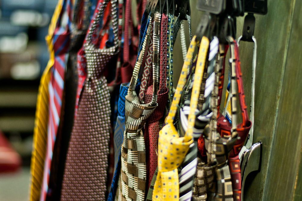 Assorted men's patterned neckties on display
