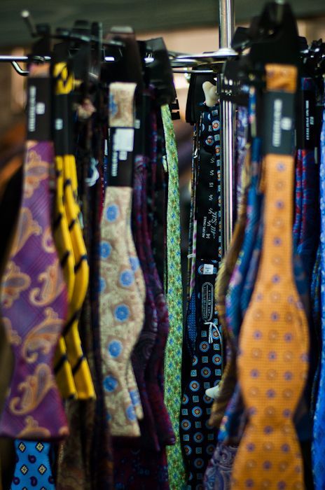 Assorted men's bow ties displayed in the store