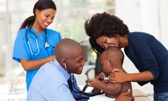 Medical staffs checking a baby