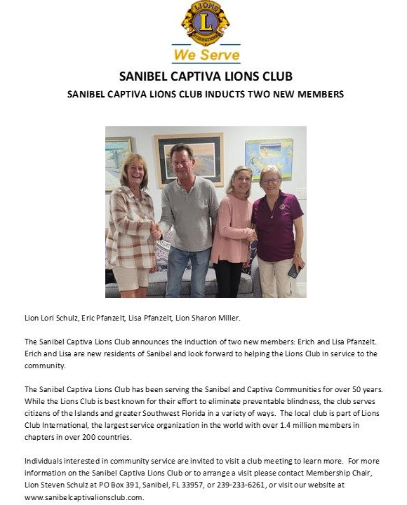 Four people posing together; text overlay on document.