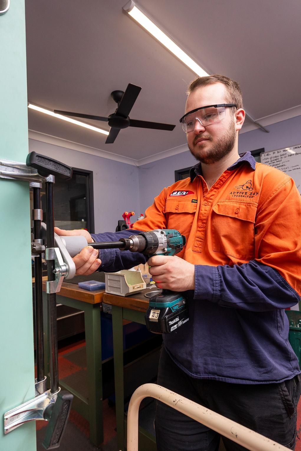 Man Wearing Safety Glasses — Active 247 Locksmith and Security Services Forster In Seal Rocks, NSW