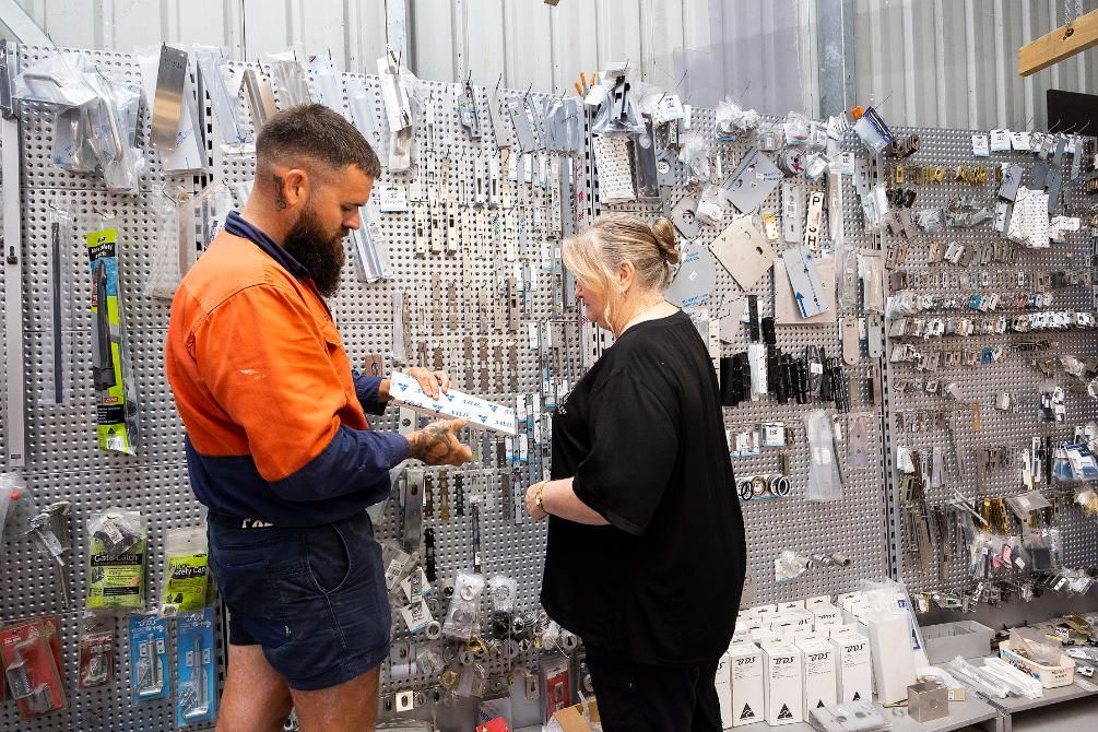 Man and Woman Looking at Hardware — Active 247 Locksmith and Security Services Forster In Forster, NSW