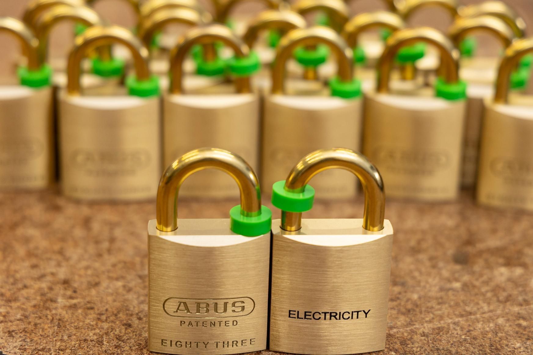 Golden Padlocks With Green Protective Rings — Active 247 Locksmith and Security Services Forster In Smiths Lake, NSW