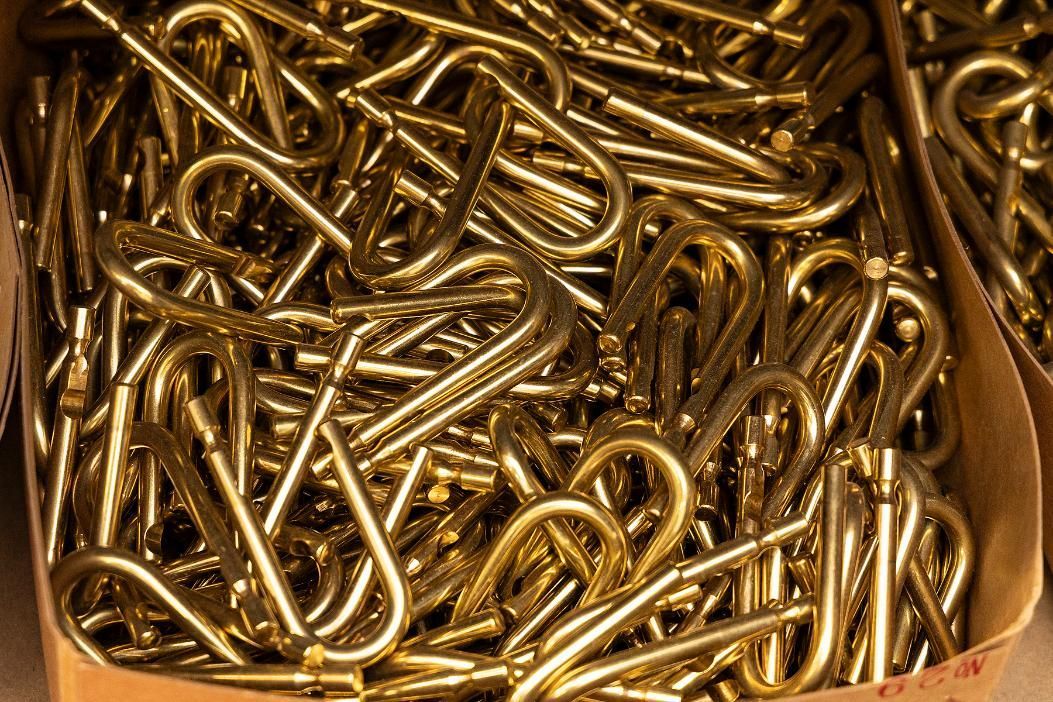 Box Overflowing With Golden, Bent Metal Hooks — Active 247 Locksmith and Security Services Forster In Taree, NSW