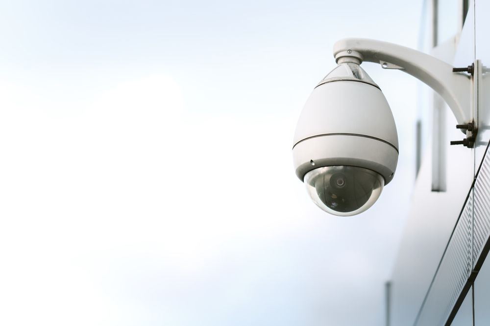 A Security Camera Is Mounted on The Side of A Building — Active 247 Locksmith and Security Services Forster In Old Bar, NSW