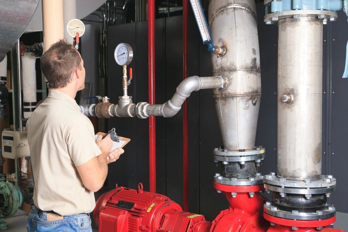 Plumber Checking the Inudstrial Pipes — Cincinnati, OH — Mike Hensley Plumbing, Inc.