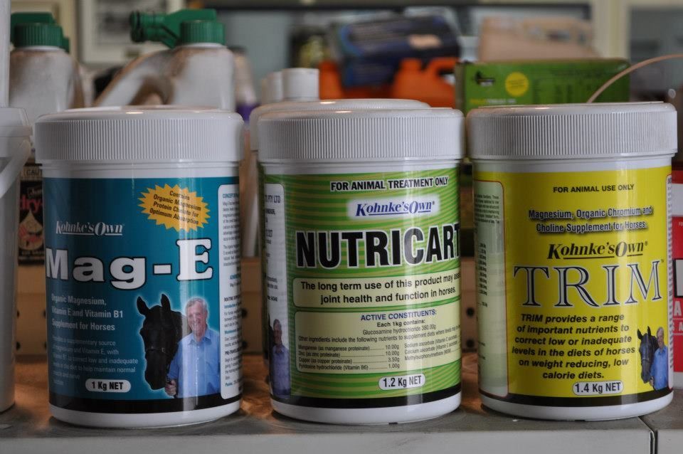 Three Bottles of Mag-e Nutricare and Trim Are on a Shelf — MacCallum & Company In Scone, NSW