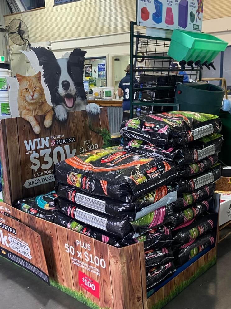 A Display of Dog and Cat Food in a Store — MacCallum & Company In Scone, NSW