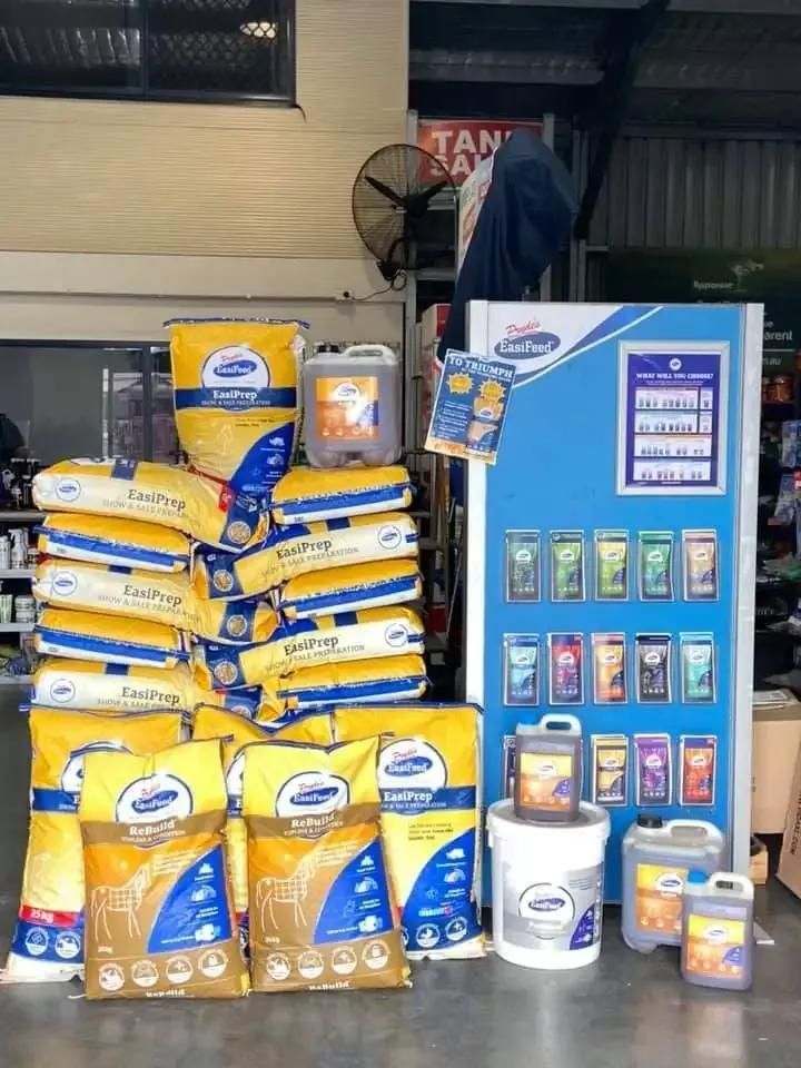 A Bunch of Bags of Food Are Stacked on Top of Each Other — MacCallum & Company In Scone, NSW
