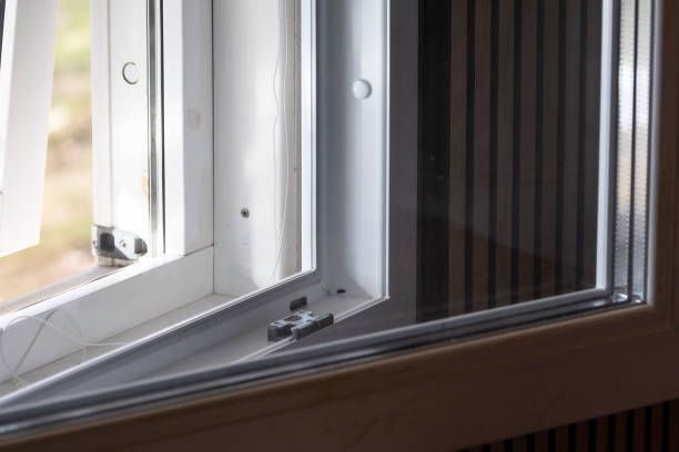 Double-glass window showcasing modern architecture with reflections, enhancing energy efficiency and