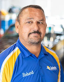 Man in blue and yellow shirt with