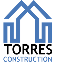 A blue and black logo for torres construction