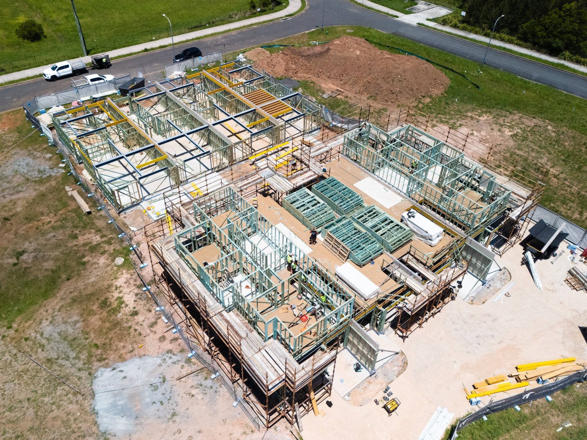 An aerial view of a large building under construction. — J.White Carpentry & Renovations in Port Macquarie, NSW 